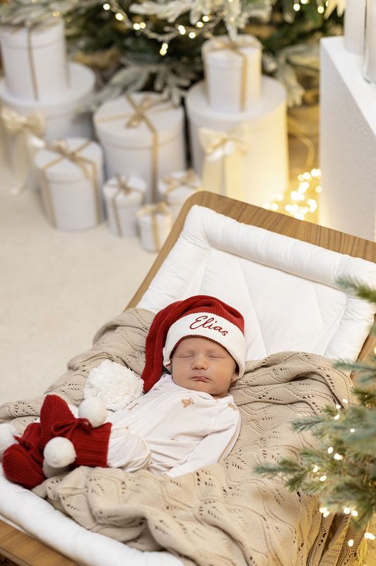 Julebooties med hvite pompom dusker